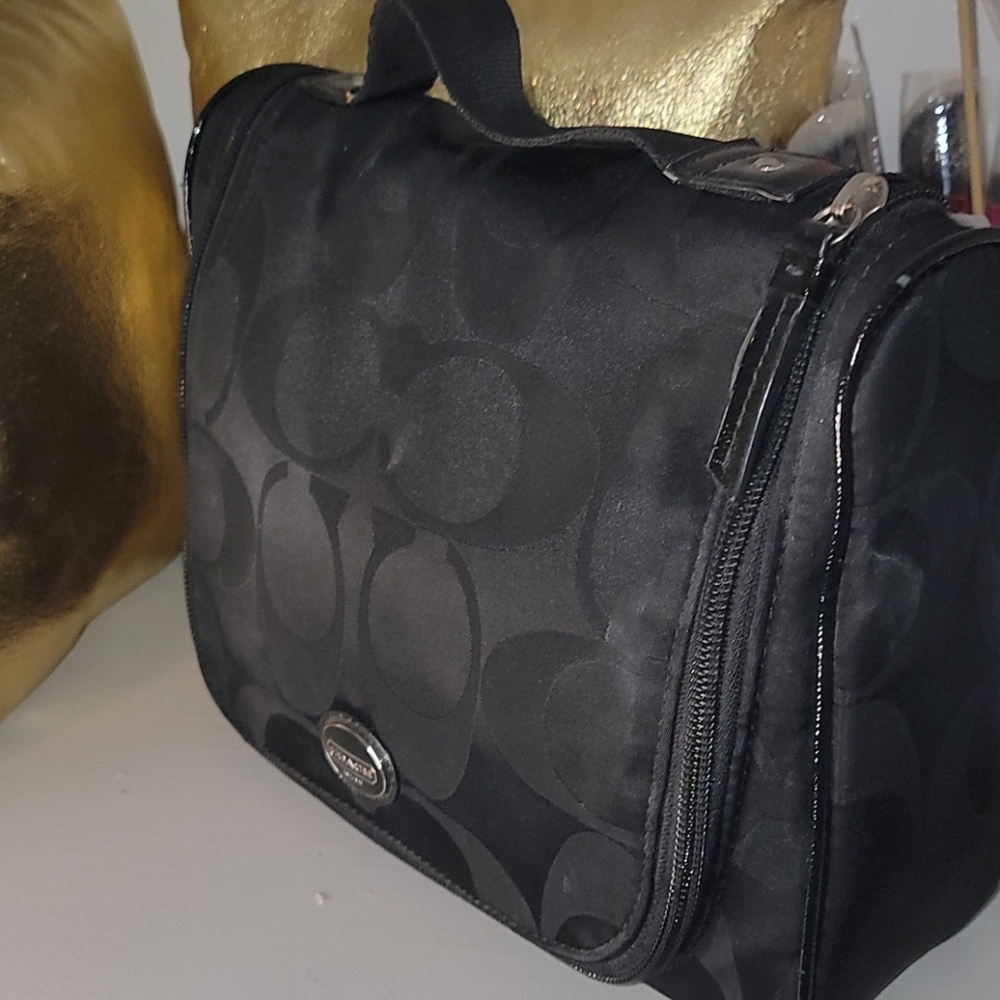 Gently/barely used medium coach cosmetic bag